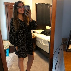 Black dress with white polka dots